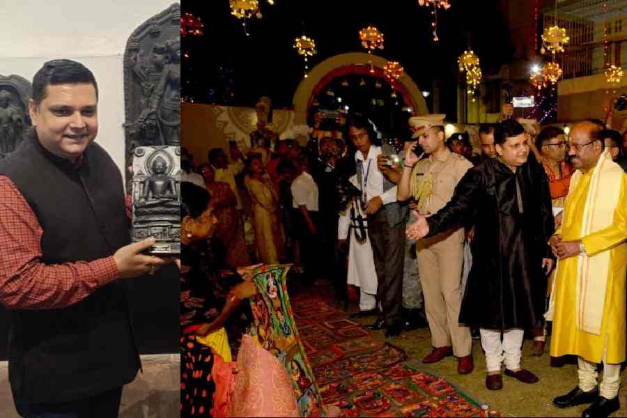 Sayan Bhattacharya, director, Indian Museum and (right) Governor C.V. Ananda Bose being welcomed at the Karunamoyee G Block puja by resident Sayan Bhattacharya
