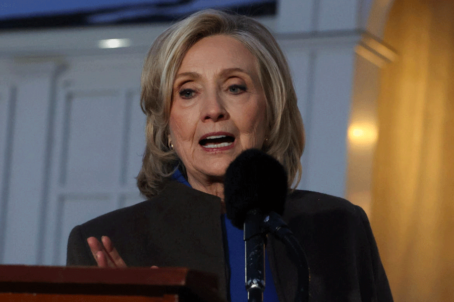 Former U.S. Secretary of State Hillary Clinton speaks to the members of the media outside the Chappaqua Performing Arts Center, on the day she appears for a deposition in the House Oversight Committee investigation of late financier and convicted sex offender Jeffrey Epstein, in Chappaqua, New York, U.S., February 26, 2026.
