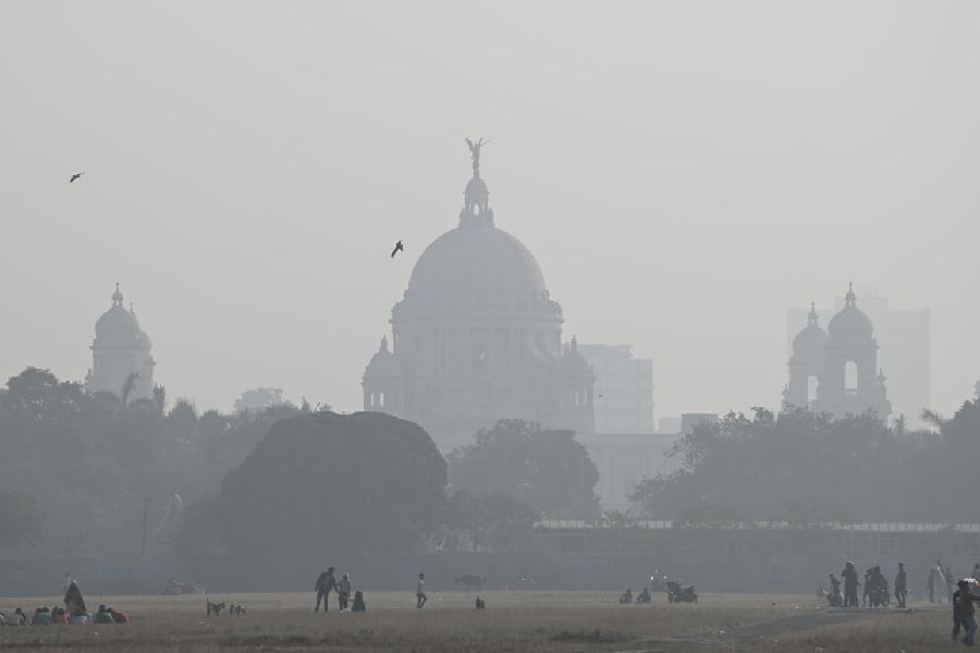 Visitors to a haze-covered Maidan on Wednesday afternoon