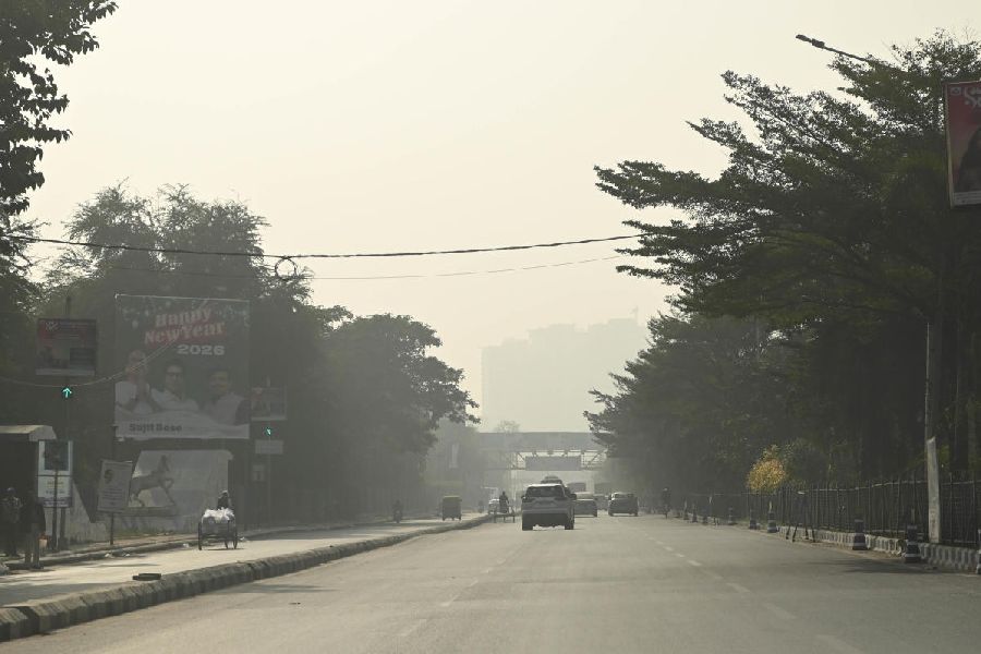 Vehicles amid smog on VIP Road on Wednesday