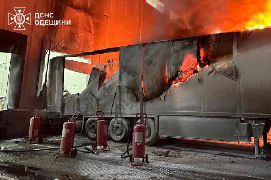 A cargo semi-truck burns at a logistics centre after it was hit during an overnight Russian drone strike in Odesa, Ukraine, on Wednesday.