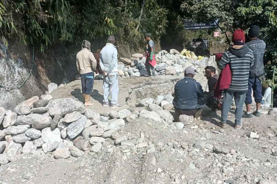 Repairs in progress on a damaged stretch of the Subash Ghisingh Marg in Kurseong.