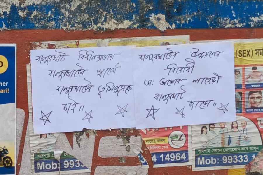 A handwritten poster put up against local BJP MLA Ashok Lahiri in Balurghat on Wednesday