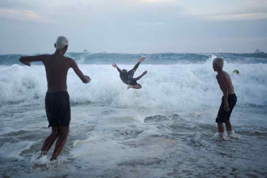 People play in the waves ahead of New Year's celebrations, at the Copacabana beach in Rio de Janeiro, Brazil. Reuters picture