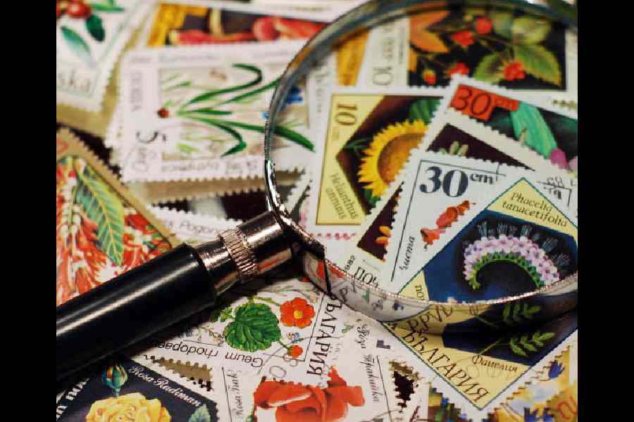 Stamps and a magnifying glass