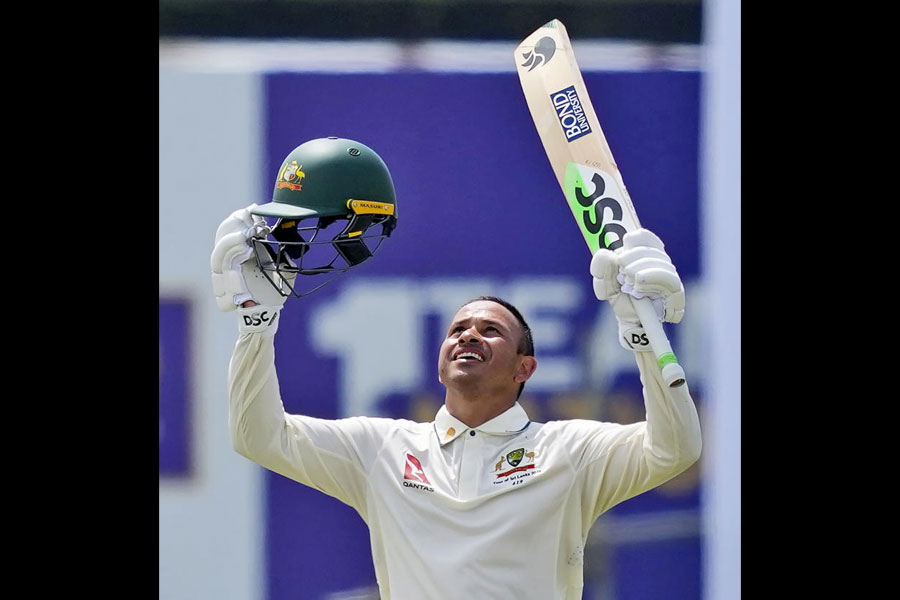 Australia's Usman Khawaja celebrates after scoring a double century during day two of the first test cricket match between Sri Lanka and Australia in Galle, Sri Lanka, Thursday, Jan. 30, 2025.