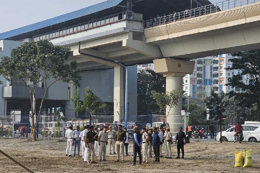 Bidhannagar Police officials confer about security arrangements with Hidco officials at the Durga Angan site last week ahead of the foundation stone unveiling. 