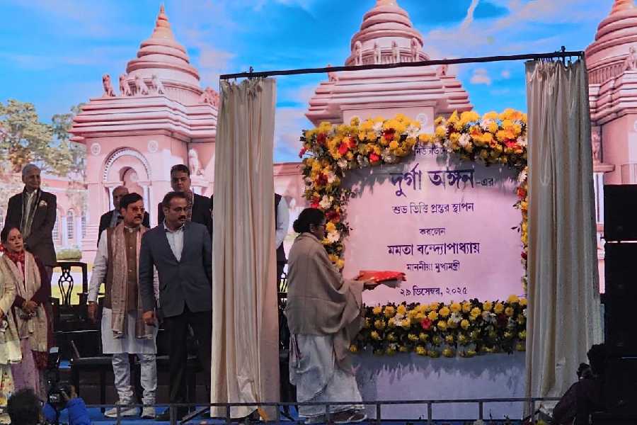 Mamata Banerjee offers a sari at the Durga Angan foundation stone- laying ceremony in New Town on Monday. 