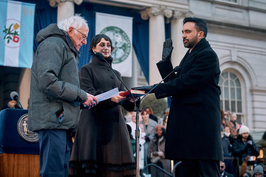 U.S. Sen. Bernie Sanders, I-Vt., left, administers the oath of office to Mayor Zohran Mamdani, right, as Rama Duwaji, center, holds the Quran during Mamdani's inauguration ceremony, Thursday, Jan. 1, 2026, in New York.
