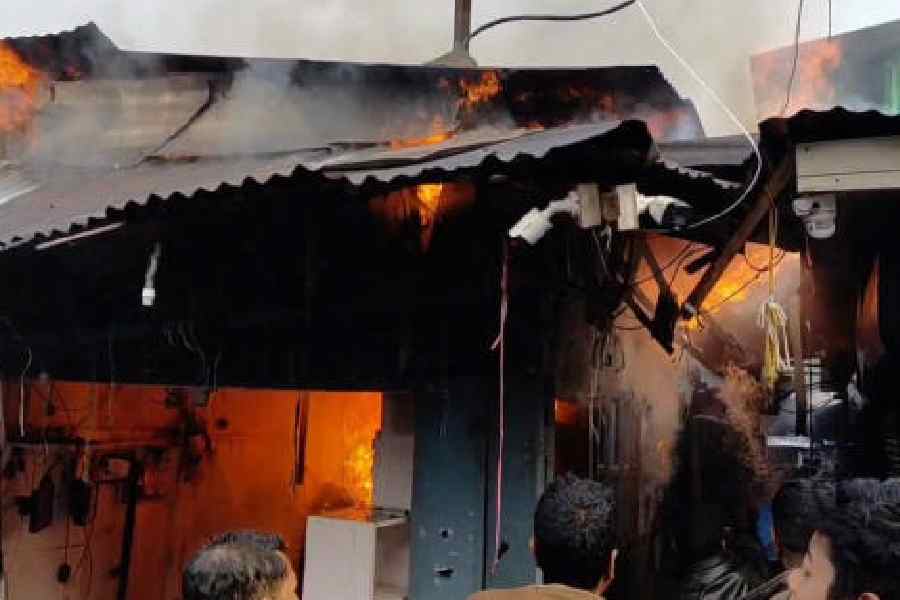 A shop engulfed by the blaze at the market in Mainaguri, Jalpaiguri, on Friday. Pictures by Biplab Basak