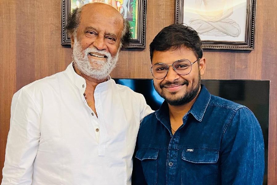 Cibi Chakaravarthi (right) with Rajinikanth (left)