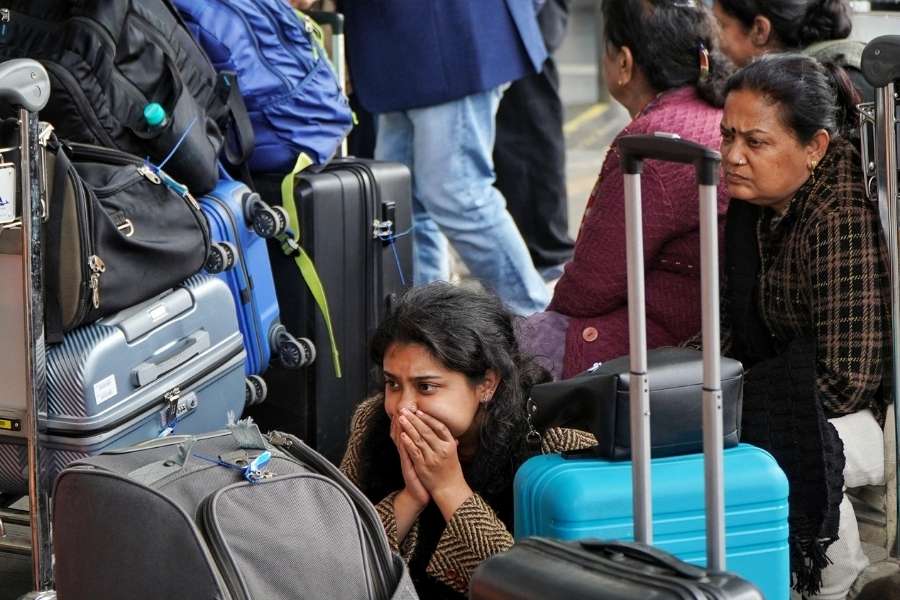 Passengers at Kolkata Airport on 5 December 2025