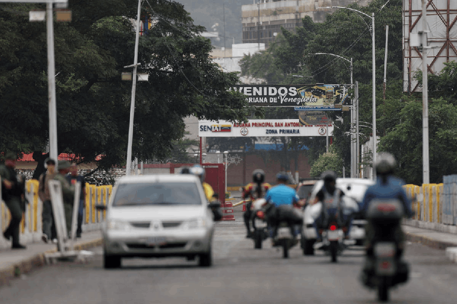 Vehicles drive by the border between Venezuela and Colombia, after U.S. President Donald Trump said the U.S. has struck Venezuela and captured its President Nicolas Maduro