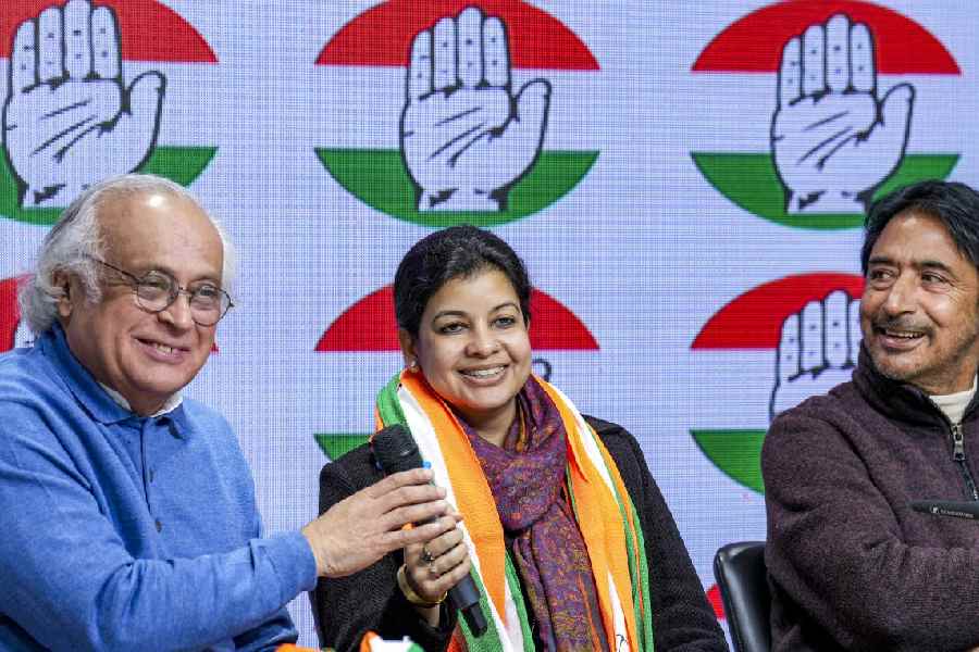 Mausam Noor (right) and Jairam Ramesh at the Congress headquarters in New Delhi on Saturday.