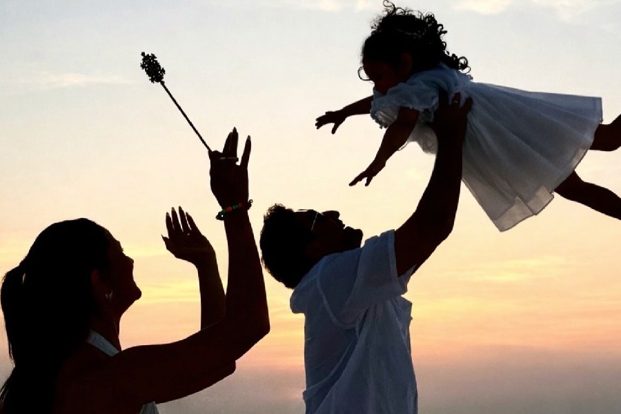 Alia Bhatt with Ranbir Kapoor and Raha