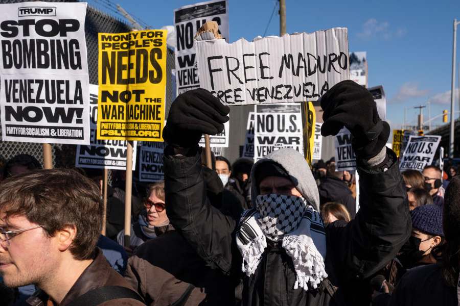 A protester holds a sign reading "Free Maduro" outside Metropolitan Detention Center on Sunday, Jan. 4, 2026, in New York.