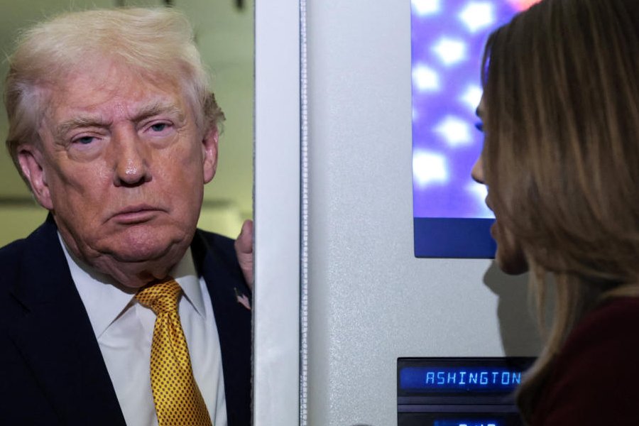 US President Donald Trump listens to a reporter’s question aboard Air Force One en route from Florida to Joint Base Andrews, Maryland, US, January 4, 2026.