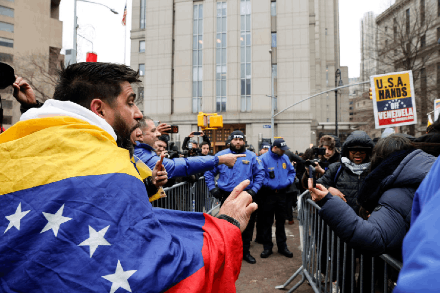 People protest outside Manhattan Federal Court before the arraignment of Venezuelan President Nicolas Maduro, Monday, Jan. 5, 2026, in New York.