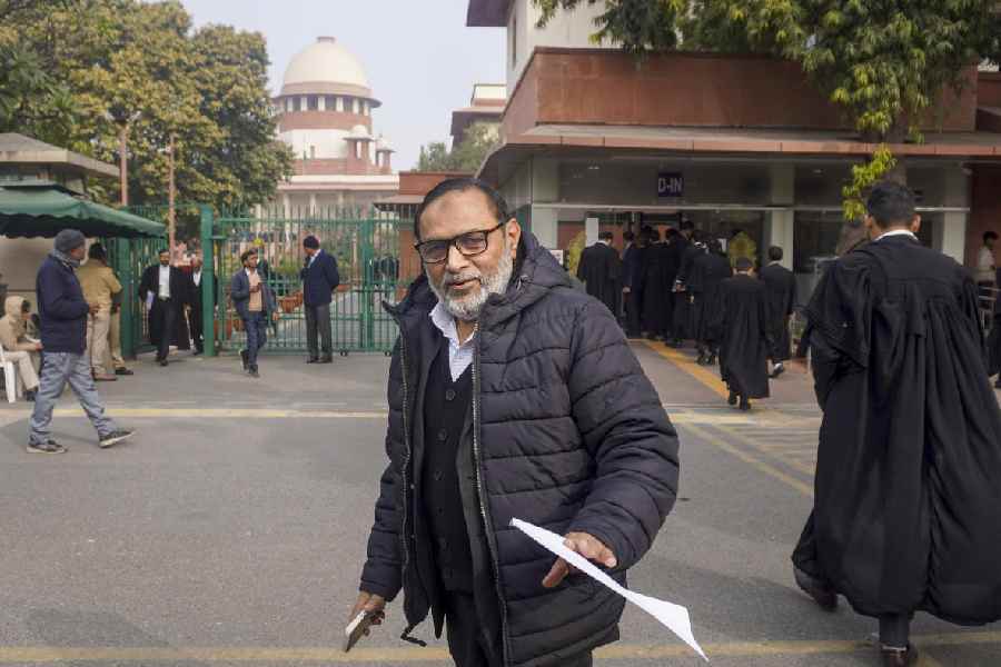 Qasim Ilyas, father of activist Umar Khalid outside the Supreme Court, in New Delhi, Monday, Jan. 5, 2026.