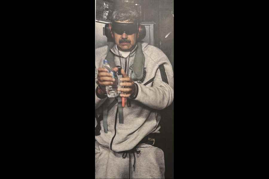 Nicolas Maduro in the Nike Tech Fleece tracksuit aboard the USS Iwo Jima