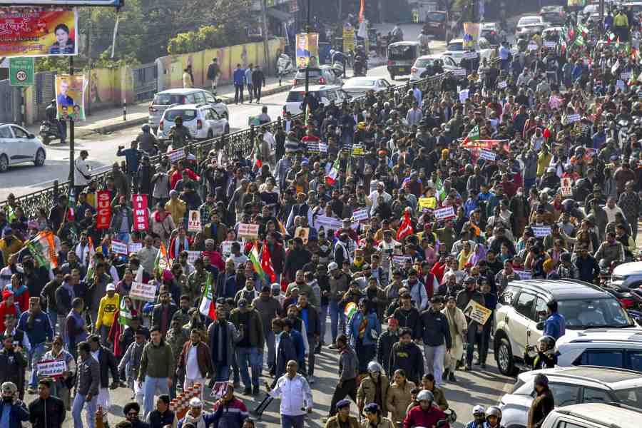 Members of various organisations take part in a protest march towards the Uttarakhand Chief Minister’s residence, demanding a CBI probe into the Ankita Bhandari murder case, in Dehradun