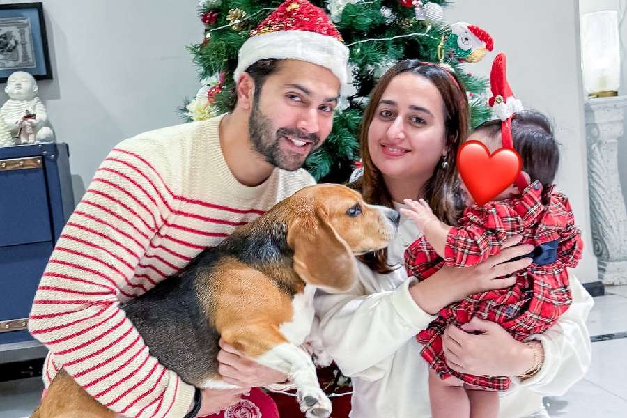 Varun Dhawan and wife Natasha Dalal with their daughter Lara