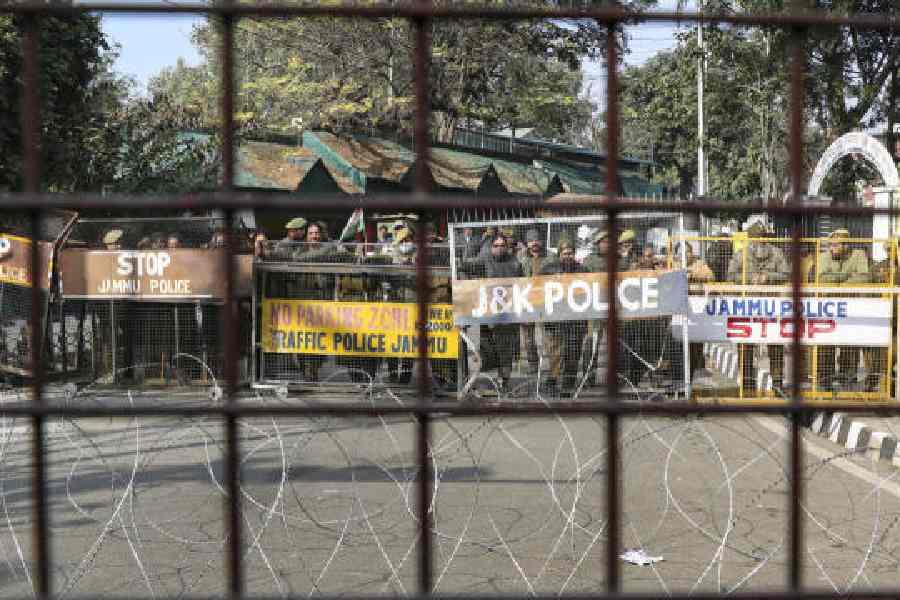 Police keep vigil during a demonstration demanding revocation of the MBBS admission list of the Shri Mata Vaishno Devi Institute of Medical Excellence in Reasi on Tuesday. 