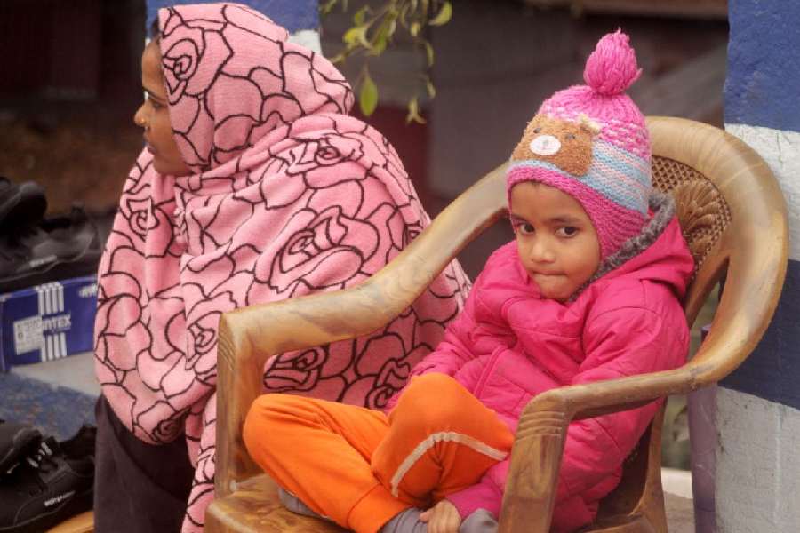 A child wrapped in the winterwear in Siliguri.