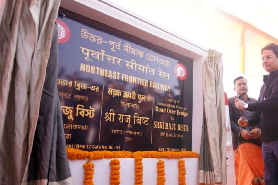 Raju Bista lays the foundation stone of the rail over bridge at Rangapani near Siliguri on Wednesday.