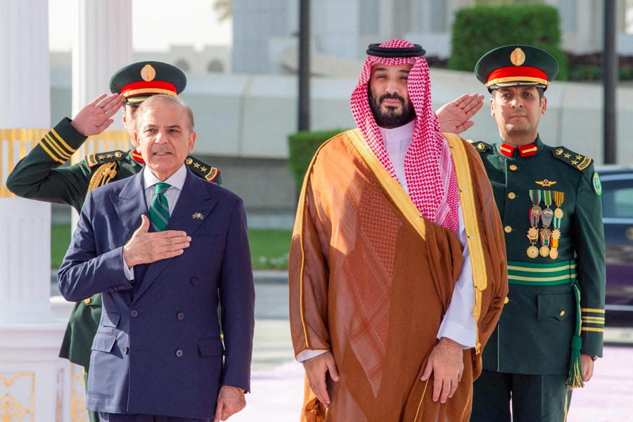 FILE PHOTO: Saudi Crown Prince Mohammed bin Salman and Pakistan Prime Minister Shehbaz Sharif sign a defence agreement in Riyadh