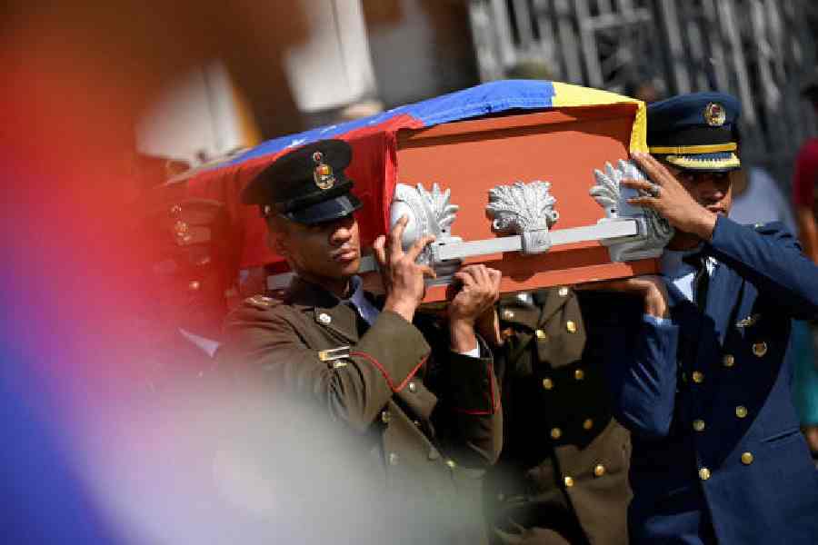 Military personnel in Caracas on Wednesday carry a casket during the funeral of soldiers killed in the US operation to capture Nicolas Maduro and his wife Cilia Flores. 