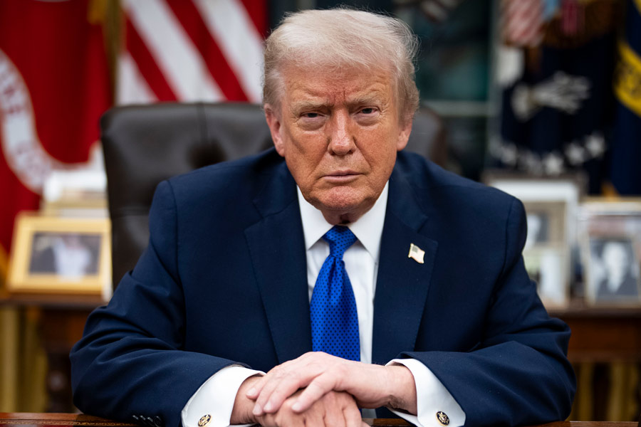 President Donald Trump gives an interview to New York Times journalists, in the Oval Office of the White House in Washington on Wednesday evening, Jan. 7, 2026.