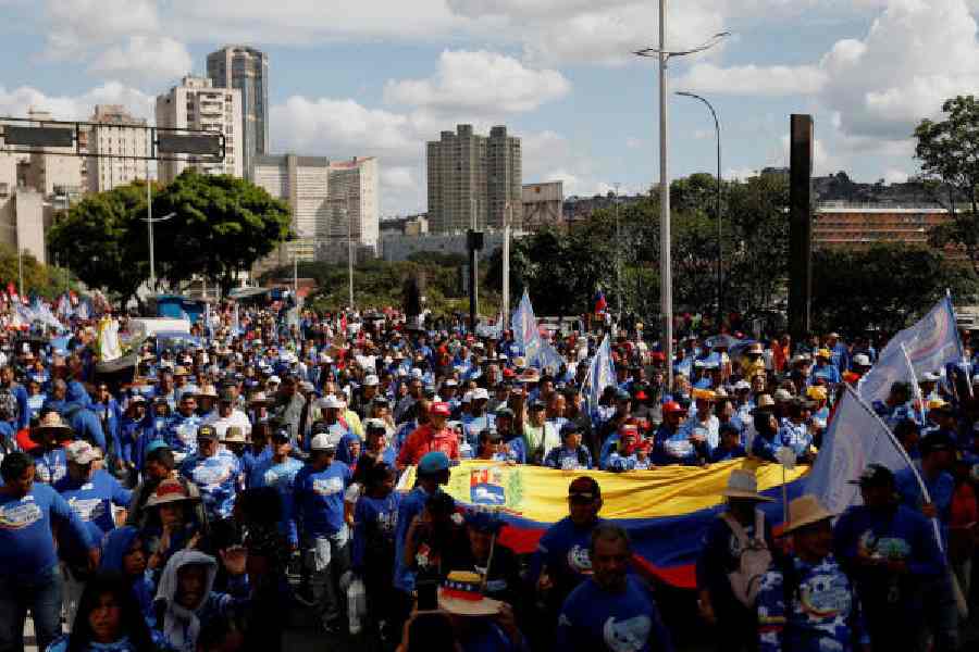 Supporters of Nicolas Maduro march in Caracas, Venezuela, on Friday, calling for the release of the ousted President. 