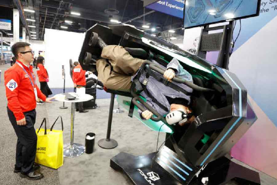 Attendee Ann Zuo tries out a virtual 360-degree Spacewalk Experience during CES 2026, an annual consumer electronics trade show, in Las Vegas