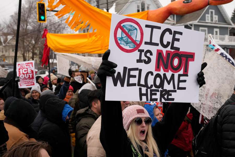 Protesters march during a rally for Renee Good, who was fatally shot by an ICE officer earlier in the week, in Minneapolis