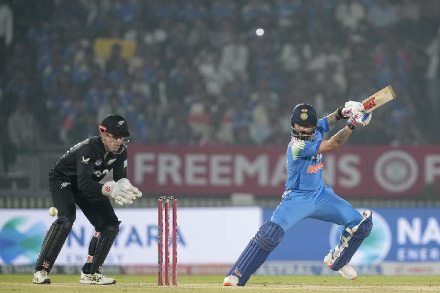 Virat Kohli plays a shot during the first ODI cricket match of a series between India and New Zealand, at Kotambi Stadium, in Vadodara