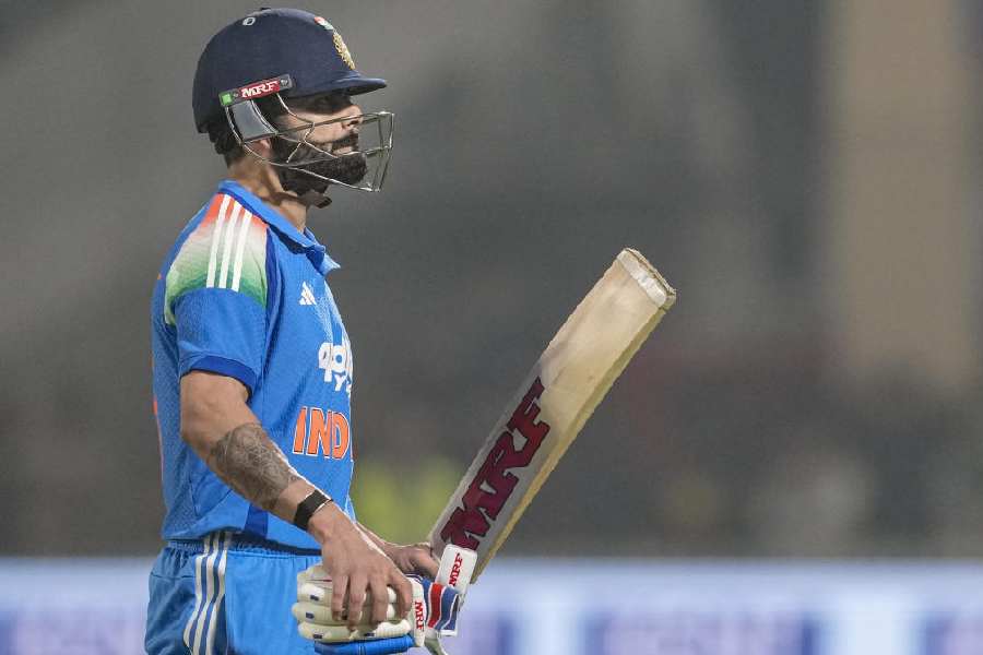 India's Virat Kohli returns to pavilion after his dismissal by New Zealand's Kyle Jamieson during the first ODI cricket match of a series between India and New Zealand, at Kotambi Stadium