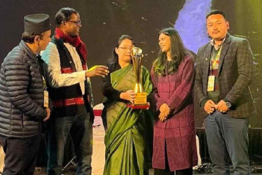 Representatives of the tourism and civil aviation department of Sikkim receive the ‘Most Tourist-Friendly State of India’ award at the 9th edition of the Bengal Travel Mart 2026, at Siliguri, on Saturday. Picture courtesy: Sikkim government