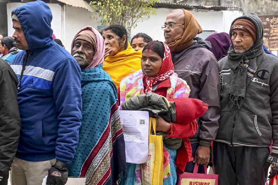 Voters queue up at an SIR hearing centre in Malda on Friday.
