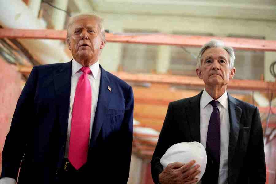 US President Donald Trump and Federal Reserve Chair Jerome Powell speak during a tour of the Federal Reserve Board building, which is currently undergoing renovations, in Washington, D.C., US, July 24, 2025.