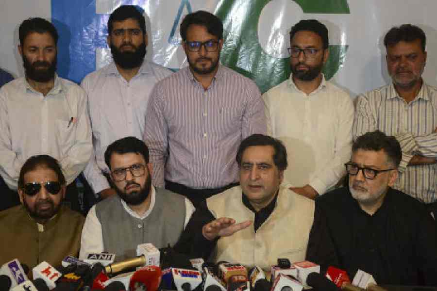 Sajad Lone (lower row, second from left)