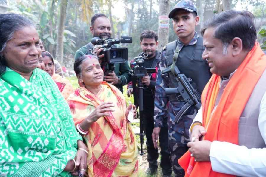 Sukanta Majumdar interacts with Singur residents on Wednesday.