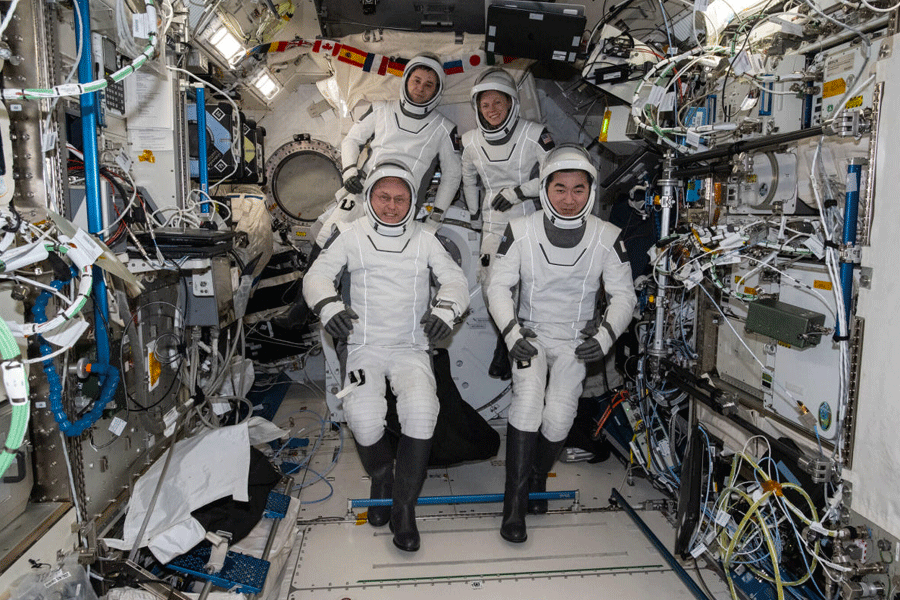 This photo provided by NASA shows clockwise from bottom left are, NASA astronaut Mike Fincke, Roscosmos cosmonaut Oleg Platonov, NASA astronaut Zena Cardman, and JAXA (Japan Aerospace Exploration Agency) astronaut Kimiya Yui gathering for a crew portrait wearing their Dragon pressure suits during a suit verification check inside the International Space Station‚Äôs Kibo laboratory module, Wednesday, Jan. 14, 2026.