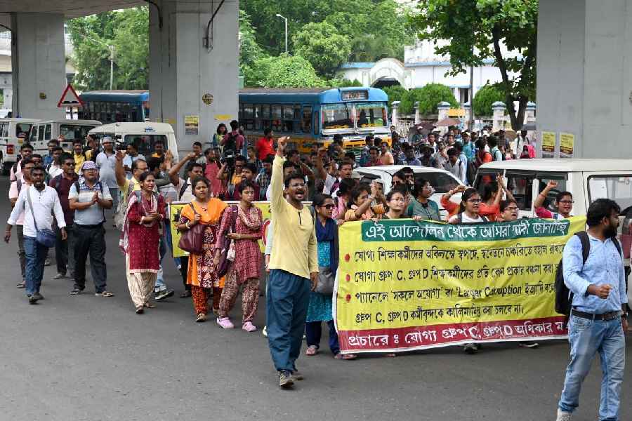 Sacked Group C and D employees at a protest march to Bikash Bhavan in June 2025.