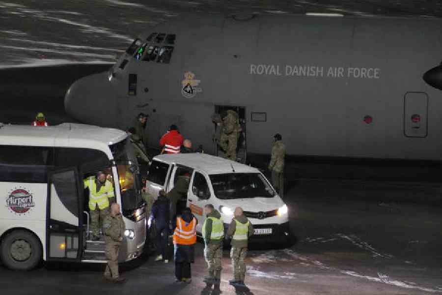 A Royal Danish Air Force plane lands at Nuuk airport on Wednesday.