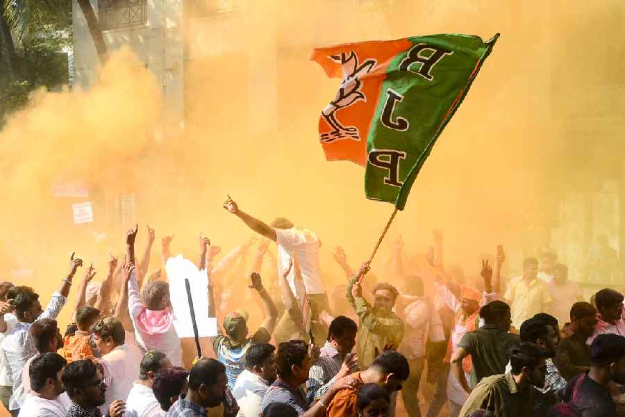 BJP workers celebrate a candidate’s victory in the Navi Mumbai Municipal Corporation polls on Friday.