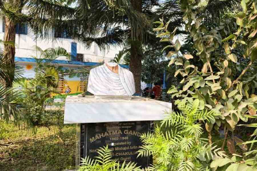 A bust of Mahatma Gandhi damaged during Thursday’s mob violence and arson at the BDO office of Goalpokher-II block in Chakulia, North Dinajpur, on Friday. Picture by Kousik Sen