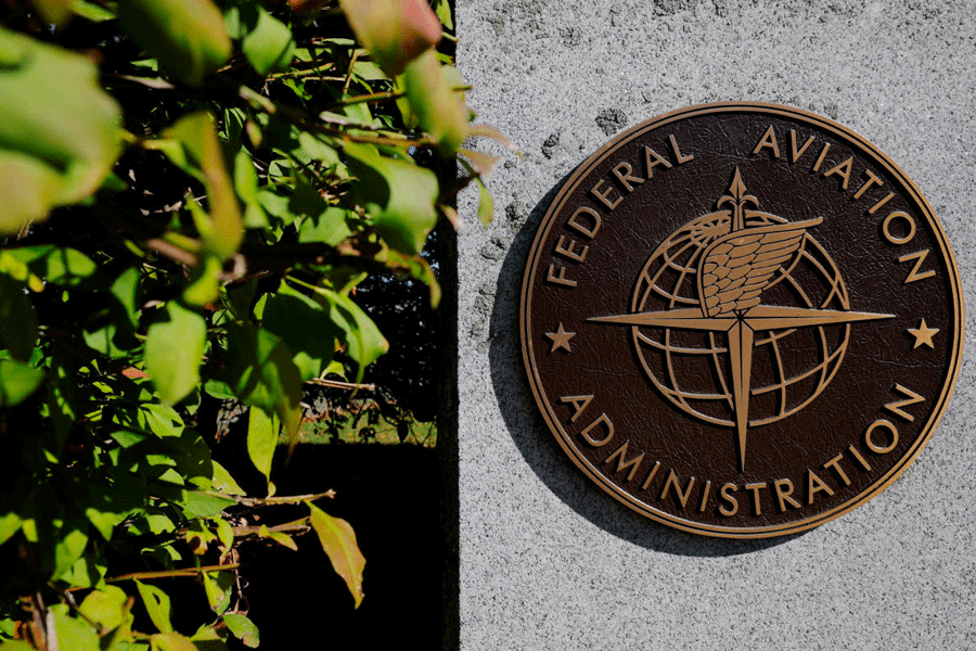 FILE PHOTO: A sign marks the Federal Aviation Administration's (FAA) Boston Air Route Traffic Control Center, where air traffic controllers continue to work during the U.S. government shutdown, in Nashua, New Hampshire, U.S., October 9, 2025.