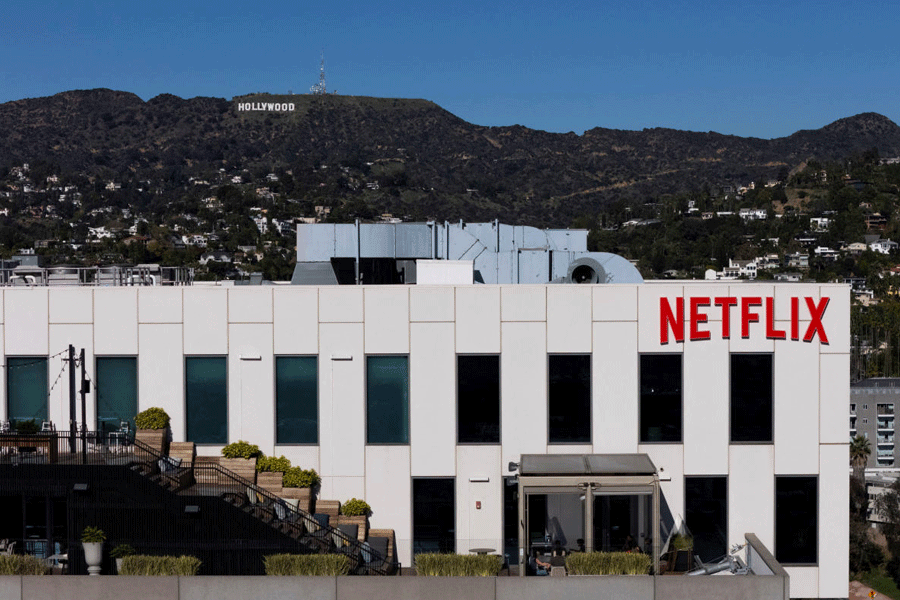 FILE PHOTO: Netflix logo in front of the Hollywood sign