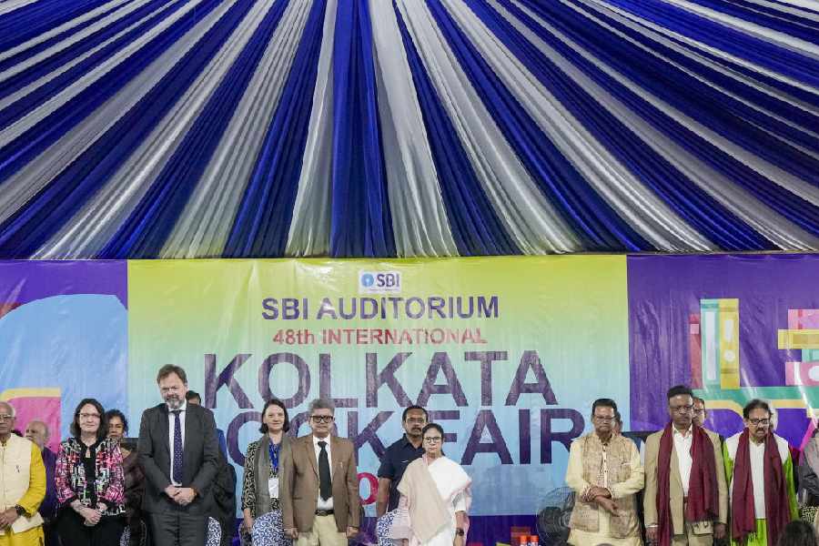 West Bengal Chief Minister Mamata Banerjee with German Ambassador to India Philipp Ackermann, 3rd from left, and President of the Publishers and Booksellers Guild Tridib Chatterjee, 4th from left, during the inaugural ceremony of the 48th International Kolkata Book Fair, in Kolkata